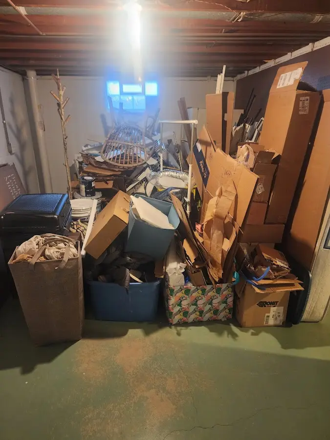 Roll-off dumpster container at job site for 4 Yard Dumpster Rental in Denver